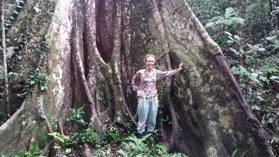 Spirituality Rooted in Nature2 Woman standing in front of ancient tree